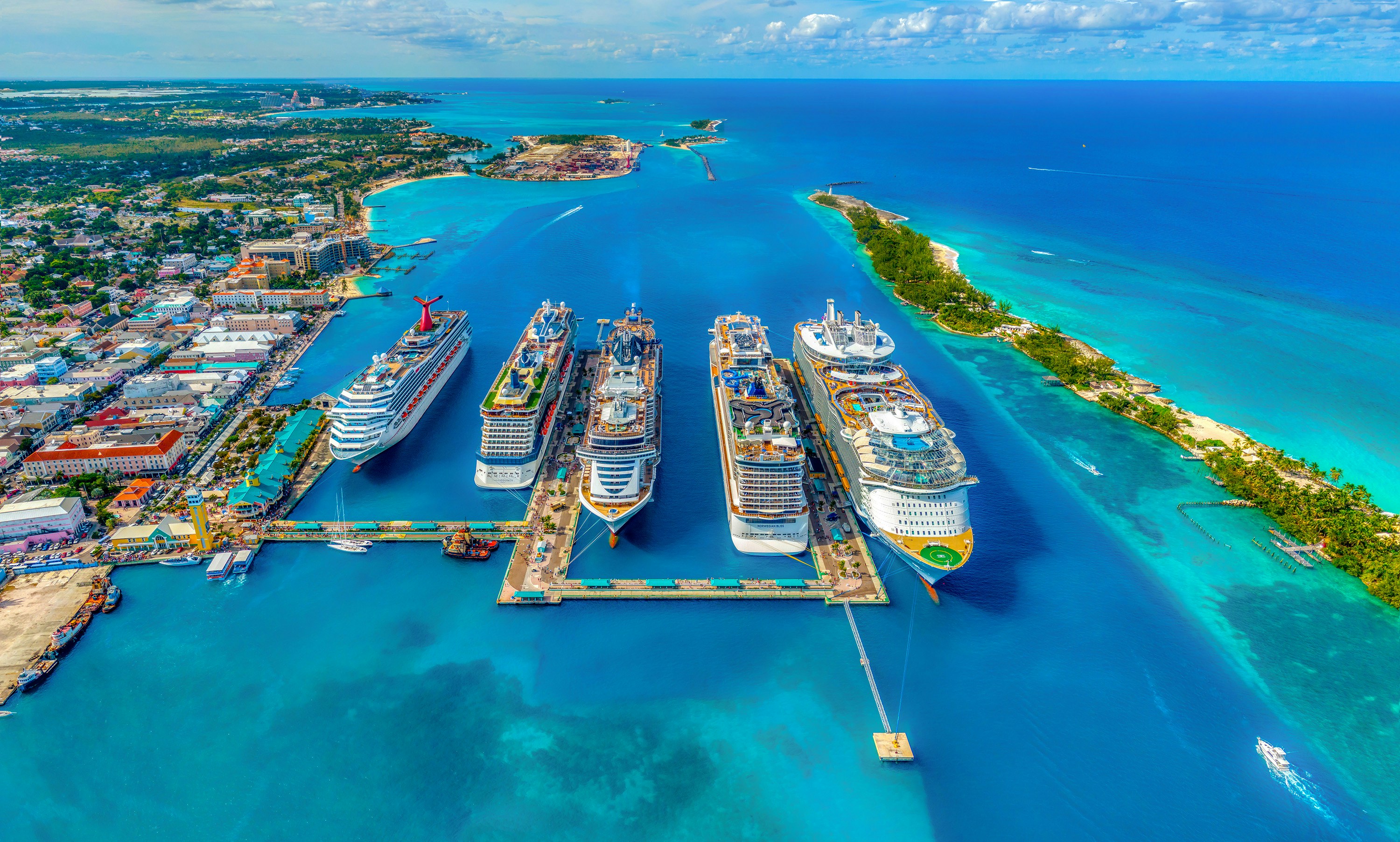 Aerial view of several cruise ships docked together in Nassau, Bahamas